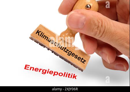 Klimaschutzgesetz ein Holzstempel ist beschriftet mit dem Aufdruck: Klimaschutzgesetz und dem Abdruck Energiepolitik *** Klimaschutzgesetz Ein Holz Stockfoto