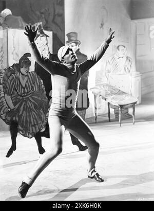 GENE KELLY in einer Szene aus EINEM AMERIKANER IN PARIS 1951 Regisseur VINCENTE MINNELLI Musik und Texte von GEORGE und IRA GERSHWIN Geschichte und Drehbuch ALAN JAY LERNER Kostümdesign ORRY-KELLY Produzent ARTHUR FREED Metro Goldwyn Mayer Stockfoto