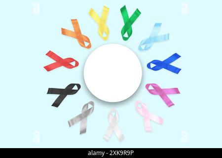 Kreis aus farbenfrohen Farbbändern mit Platz für Text auf blauem Hintergrund. World Cancer Day Concept, 4. Februar. Gesundheitswesen und Medizinkonzept. Stockfoto