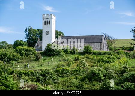 Manorbier Church, liegt im Dorf, Gemeinde und Pfarrei an der Südküste von Pembrokeshire, Wales. Stockfoto