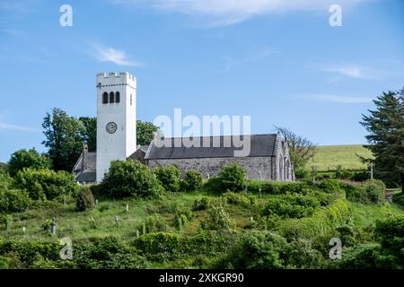 Manorbier Church, liegt im Dorf, Gemeinde und Pfarrei an der Südküste von Pembrokeshire, Wales. Stockfoto