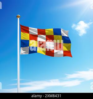 Die winkende Flagge von Antwerpen ist eine belgische Provinz auf einem Fahnenmast mit Himmelshintergrund. Stockfoto