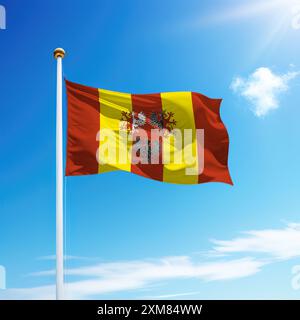 Die winkende Flagge von Lodz ist eine Region Polens auf Fahnenmast mit Himmelshintergrund. Stockfoto