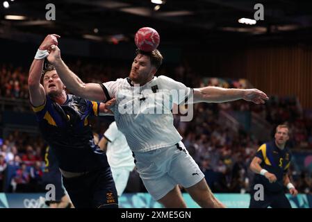 Julien Mattia/Le Pictorium - Handball - Paris 2024 - Deutschland, Schweden. Juli 2024. Frankreich/Ile-de-France (Region)/Paris - Deutschland gewinnt am 27. Juli 2024 in der Paris Sud Arena in Paris das fünfte Spiel der Gruppe A der Vorrunde der Olympischen Spiele der Männer zwischen Schweden und Deutschland. Quelle: LE PICTORIUM/Alamy Live News Stockfoto