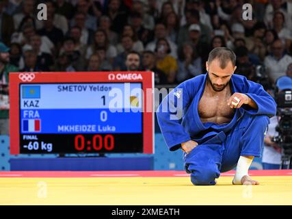 Paris, Frankreich. Juli 2024. Mkheidze Luka von Frankreich reagiert auf das 60 kg schwere Judo-Endspiel der Männer bei den Olympischen Spielen 2024 in Paris, Frankreich, 27. Juli 2024. Quelle: Li An/Xinhua/Alamy Live News Stockfoto