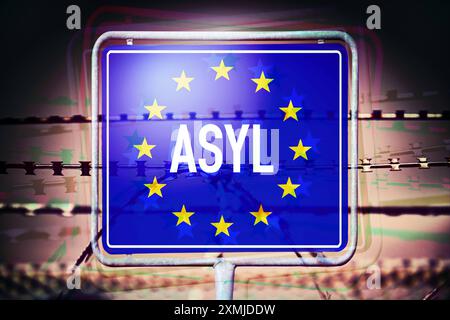 FOTOMONTAGE, EU-Schild mit Aufschrift Asyl und Stacheldraht, Symbolfoto Sicherung der EU-Außengrenzen *** FOTOMONTAGE, EU-Schild mit Aufschrift Asyl und Stacheldraht, symbolisches Foto zur Sicherung der EU-Außengrenzen Stockfoto