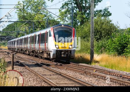 Greater Anglia British Rail Class 720 Aventra Zug von Greater Anglia durch Margaretting in Richtung Clacton on Sea, UK. Moderne Eisenbahn Stockfoto