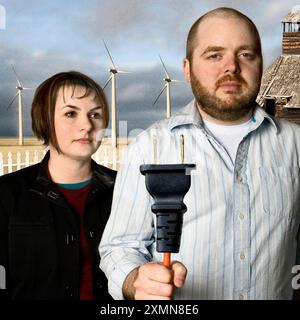 Alternativer Energieverbund basierend auf Grant Wood's American Gothic. Stockfoto