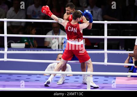 Paris, Frankreich, 29. Juli 2024. Radoslav Simeonov Rosenov von Bulgarien beim 63 kg Achtelfinale der Männer während des Spiels der Olympischen Spiele 2024 in Paris zwischen Wyatt Sanford von Kanada und Radoslav Simeonov Rosenov von Bulgarien im Roland Garros am 29. Juli 2024 in Paris, Frankreich. Quelle: Pete Dovgan/Speed Media/Alamy Live News Stockfoto