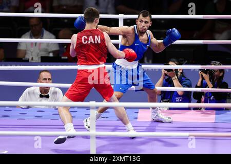 Paris, Frankreich, 29. Juli 2024. Radoslav Simeonov Rosenov von Bulgarien beim 63 kg Achtelfinale der Männer während des Spiels der Olympischen Spiele 2024 in Paris zwischen Wyatt Sanford von Kanada und Radoslav Simeonov Rosenov von Bulgarien im Roland Garros am 29. Juli 2024 in Paris, Frankreich. Quelle: Pete Dovgan/Speed Media/Alamy Live News Stockfoto