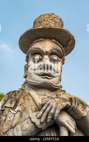 Chinesische Steinpuppe - Tor Gaurdian im Wat Pho Complex, Bangkok, Thailand Stockfoto