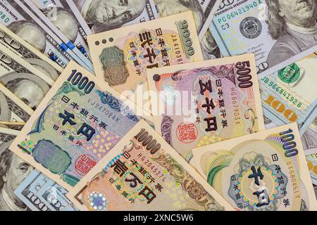 Wenn Japan eine Inflation erlebt, sollten sie ihre Ersparnisse durch den Kauf von US-Dollar investieren Stockfoto