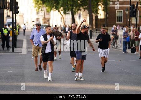 Menschen, die an dem Protest "genug ist genug" in Westminster, London, teilnehmen, nachdem drei Kinder am Montag in einem Taylor Swift-Ferienclub erstochen wurden. Bilddatum: Mittwoch, 31. Juli 2024. Stockfoto