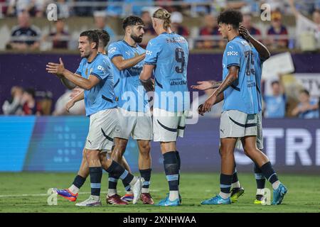 Orlando, FL: Spieler aus Manchester City feiern ihr erstes Tor mit Verteidiger Joško Gvardiol (24), der den Assist und Mittelfeldspieler Mateo Kovačić (8) verrechnet. Stockfoto