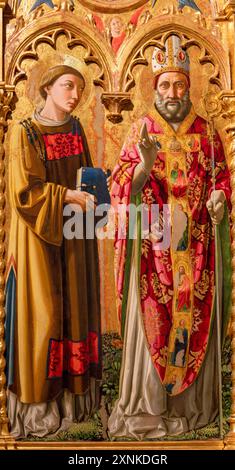 ASSISI, ITALIEN - 17. MAI 2024: Gemälde von St. Rufino und Diakon als Detail des Polyptychons in der Kathedrale San Rufino Stockfoto