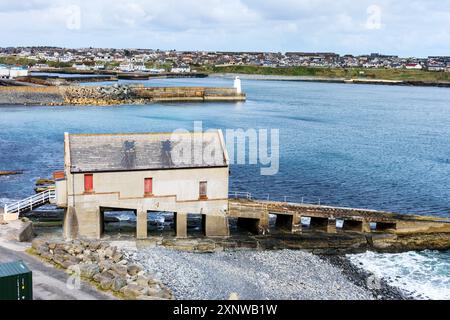 Die alte Lifeboat Station, gebaut 1915, Wick, Caithness, Schottland, UK. Heute gehört die Wick Society, einer Kulturerbeorganisation. Stockfoto