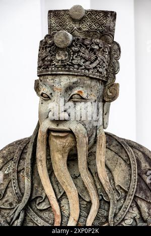 Chinesische Wächterfigur im Wat Pho Complex, Bangkok, Thailand Stockfoto