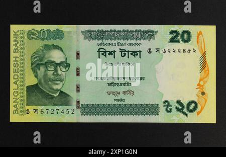 Nahaufnahme eines Bangladesch Twenty Take-Banknotenporträts von Scheich Mujibur Rahman. Stockfoto