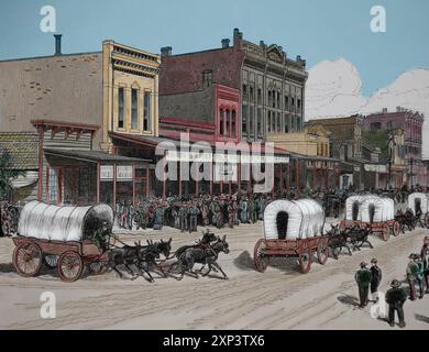 US. Ein Wagenzug von Siedlern, die gehofft hatten, Land in Oklahoma zu beanspruchen, verlassen Arkansas City, Kansas. Gravur. Frank Leslies illustrierte Zeitung, Stockfoto