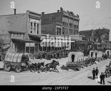 US. Ein Wagenzug von Siedlern, die gehofft hatten, Land in Oklahoma zu beanspruchen, verlassen Arkansas City, Kansas. Gravur. Frank Leslies illustrierte Zeitung, Stockfoto