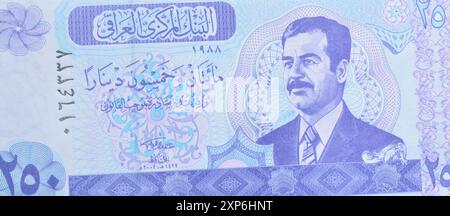 Vorderseite der 250-Dinar-Banknote, gedruckt vom Irak, die das Porträt von Saddam Hussein zeigt Stockfoto