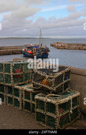 Fischerboot im Hafen von John O Groats Stockfoto