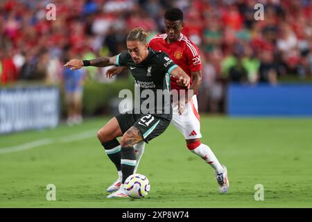 3. August 2024: Liverpool-Verteidiger Kostas Tsimikas (21) und Manchester United-Mittelfeldspieler Amad Diallo (16) während der Rivalen im Red Match zwischen Manchester United und Liverpool im Williams-Brice Stadium in Columbia, South Carolina. Greg Atkins/CSM Stockfoto