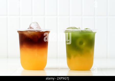 Orange Espresso und Matche Orange, Sommergetränk-Konzept Stockfoto