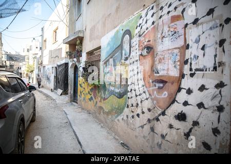 Jenin, Palästina. Juli 2024. Ein Wandbild im Flüchtlingslager Jenin, im besetzten Westjordanland. Im Juli gab der in den Haag ansässige Internationale Gerichtshof ein Gutachten heraus, in dem er besagte, dass Israel seit 57 Jahren das Westjordanland und Ostjerusalem illegal besetzt hat. Quelle: SOPA Images Limited/Alamy Live News Stockfoto