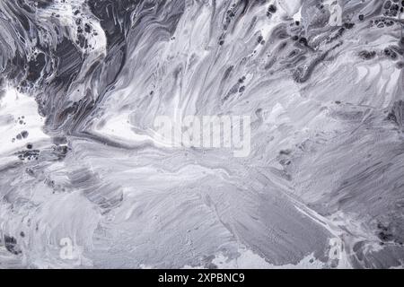 Kreative schwarze und graue marmorierte Textur mit natürlichem Fluss. Fließende Kunst Marmorhintergrund. Stockfoto