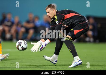 Charlotte, North Carolina, USA. August 2024. Real Madrid Torhüter ANDRIY LUNIN (13) spart während der zweiten Hälfte des Spiels der Soccer Champions Tour Real Madrid gegen Chelsea FC im Bank of America Stadium in Charlotte, NC am 6. August 2024. (Kreditbild: © Cory Knowlton/ZUMA Press Wire) NUR REDAKTIONELLE VERWENDUNG! Nicht für kommerzielle ZWECKE! Quelle: ZUMA Press, Inc./Alamy Live News Stockfoto