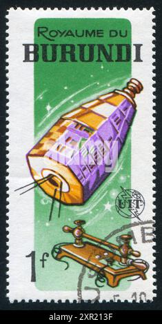 BURUNDI - CIRCA 1965: Stempel gedruckt von Burundi, zeigt Satellit, um 1965 Stockfoto