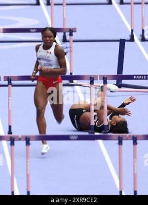 Paris, Frankreich. August 2024. Ebony Morrison (R) aus Liberia fällt während des Halbfinales der Leichtathletik über 100 m bei den Olympischen Spielen 2024 in Paris, Frankreich, 9. August 2024. Quelle: Li Ying/Xinhua/Alamy Live News Stockfoto