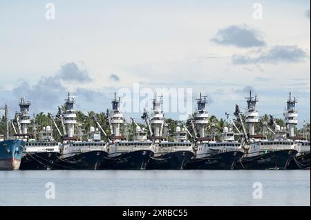 PAPUA-NEUGUINEA, Madang, Alexishafen, Thunfischfangschiff von RD Fishing PNG Ltd, Thunfischfang für eigene Konservenfabrik RD Thuna Canners Ltd. Für lokalen Markt und Export / PAPUA NEUGUINEA, Madang, Alexishafen, Thunfisch Fangflotte von RD Fishing PNG Ltd, Thunfisch wird in eigener Fabrik RD THUNFISCH CANNERS Ltd. für Herstellung von Thunfischdosen, frischem Thunfisch und Tiefkühlware für lokalen Markt und Export u.a. nach Europa verarbeitet, Thunfisch Fangschiffe Dolly 888 und Dolores Stockfoto