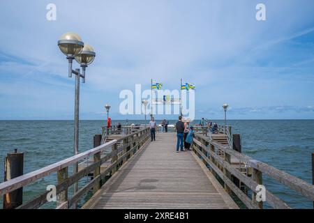 Seebrücke Graal Müritz Deutschland im Sommer 2024: Die hölzerne Seebrücke im Ostseeheilbad Graal Müritz bei Rostock. *** Graal Müritz Pier Deutschland im Sommer 2024 die Holzpier im Ostseebad Graal Müritz bei Rostock Stockfoto