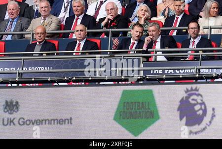 (Von links nach rechts) Dave Brailsford von Manchester United, Omar Berrada, Sportdirektor Dan Ashworth und technischer Direktor Jason Wilcox während des FA Community Shield Spiels im Wembley Stadium, London. Bilddatum: Samstag, 10. August 2024. Stockfoto