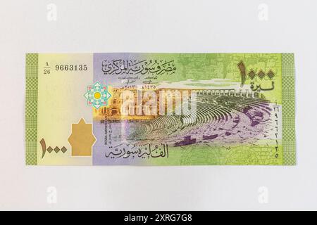 Syrien eine Tausend-Pfund-Banknote zeigt das Bosra-Amphitheater auf der Beobachtung. Stockfoto