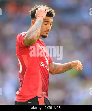 London, Großbritannien. August 2024 - Manchester City gegen Manchester United - Community Shield - Wembley Stadium. Jadon Sancho von Manchester United reagiert darauf, dass er einen Elfmeter im Shootout gegen Manchester City verpasst hat. Bildnachweis: Mark Pain / Alamy Live News Stockfoto