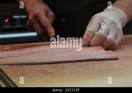 Kochszene mit japanischer Küche (Aal Bowl) in Tokio, Japan Stockfoto