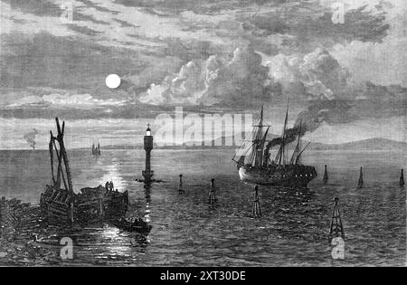 Die Bitter Lakes, Suez Canal, 1870. "Das Binnenmeer erstreckt sich nun so weit das Auge reicht; große Dampfschiffe fahren über es mit Schrauben oder Paddeln oder Segelschiffe mit Leinwänden, die in der Brise liegen; die Leuchttürme stehen wie „wundervolle Lampen“, die dort errichtet werden, um den Seefahrer zu führen, und Eisenbaken werden in Reihen platziert, um den Kanal der Sicherheit zu zeigen. Die Transformation ist so vollständig, von der verdorbenen Sandwüste bis hin zum Blick auf ein flüssiges, frisches, blaues Meer, das sich scheinbar über den Horizont erstreckt, dass man das Gefühl hat, wenn die alten Magier nicht am Werk waren, dass es dort gewesen sein muss Stockfoto