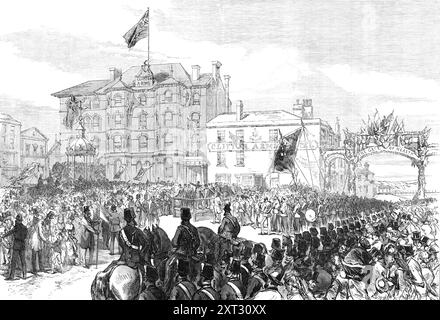 Eröffnung einer neuen Promenade und eines Trinkbrunnens am Ostermontag in Blackpool, Lancashire, 1870. „Die angenehme und gesunde Küstenstadt Blackpool... hat durch die Eröffnung der Promenade und der Kutschenfahrt und durch einen verbesserten Eingang zum feinen Eisenpier eine neue Attraktion und einen lokalen Vorteil gewonnen... die Ingenieure dieser Arbeit sind Messrs. Garlick, Park, und Sykes... Ein neuer Trinkbrunnen mit einer Bronzekuppel auf acht Säulen, einer Uhr und einer Gaslampe auf einem achteckigen Steinfuß wurde auf Bellevue oder Talbot-Platz aufgestellt... Er wurde entworfen und gegossen von den Herren G. Smith und Co. von The Sun Fo Stockfoto