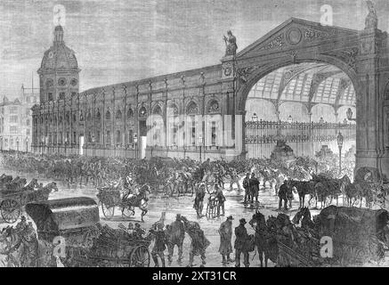 Der Fleischmarkt, Smithfield, [London], um zwei Uhr morgens, 1870. Stunden vor dem Tageslicht ist der New Smithfield Market ein Ort voller Verkehrslärm... der Vorrat wird von den fleischlosen Zügen aufrechterhalten, die nachts auf den meisten führenden Bahnlinien ankommen. Es gibt sehr wenig Ruhe auf dem Markt. Fleischwagen fahren bis zu den Toren oder kehren zu den Metzgereien zurück, mit Kadavern hoch auf ihnen... die lauten Schreie, die glitzernden Gaslichter, die Flambeaux, wenn der Morgen nebelig ist, das Bellen der Hunde, die endlose Spreu, die Hektik der ganzen Szene, können von denen nicht realisiert werden, die die wh haben Stockfoto