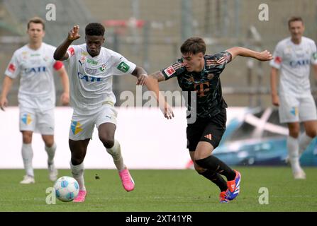Unterhaching, Deutschland. August 2024. Fußball: Testspiele, FC Bayern - WSG Tirol, Alpenbauer Sportpark. Javier Fernandez (r) vom FC Bayern München und Mahamadou Diarra (l) von der WSG Tirol. Quelle: Peter Kneffel/dpa/Alamy Live News Stockfoto