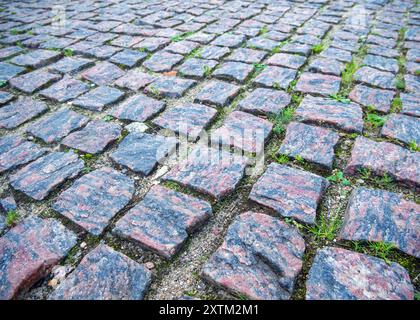 Pflaster aus gehauenem Granitstein Stockfoto