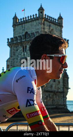 Belem, Portugal. August 2024. Joao Almeida aus Portugal vom Team Emirates aus den Vereinigten Arabischen Emiraten während der Teampräsentation im Torre de Belem vor dem 79. La Vuelta Ciclista a Espana 2024. Quelle: SOPA Images Limited/Alamy Live News Stockfoto