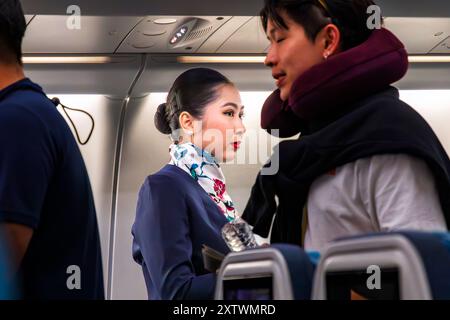 Bordpersonal von Philippine Airlines auf internationalen Flügen von Bangkok nach Manila, Philippinen Stockfoto