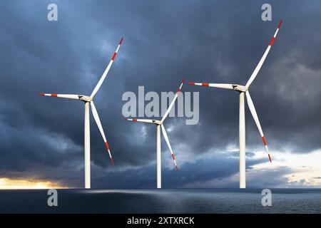 Drei Windkraftanlagen in der Nordsee, Gewitter, Windkraftanlage, Niedersachsen, Bundesrepublik Deutschland Stockfoto