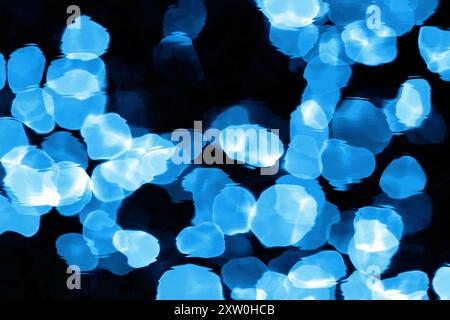 Abstrakter flüssiger Hintergrund mit blauen Lichtern Stockfoto