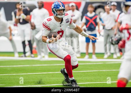 17. August 2024: Der New York Giants Quarterback Daniel Jones (8) spielt mit dem Ball während eines Vorsaisonspiels zwischen den New York Giants und den Houston Texans in Houston, Texas. Trask Smith/CSM Stockfoto