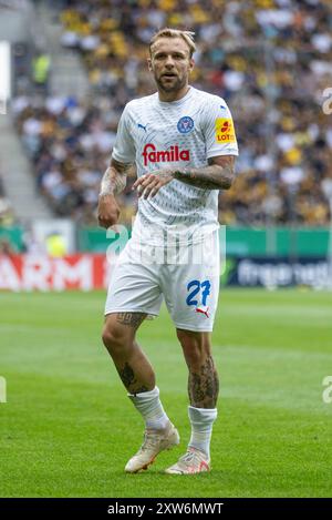 Aachen, Deutschland. August 2024. Tymoteusz Puchacz (Holstein Kiel, #27). Aachen, Fußball DFB-Pokal/1. Runde, Runde 1, Alemannia Aachen - Holstein Kiel, 17.08.2024, Tivoli, Aachen. #DFB-Vorschriften verbieten die Verwendung von Fotos als Bildsequenzen und/oder Quasi-Video # Credit: dpa/Alamy Live News Stockfoto